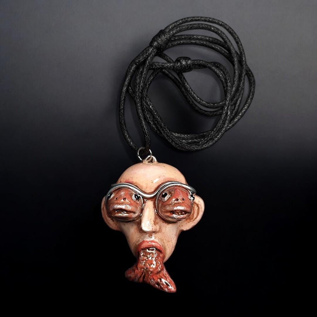 Fish Through Face Necklace ā Handmade Clay & Resin Surreal Statement Jewelry, Sculptural Wearable Art OOAK