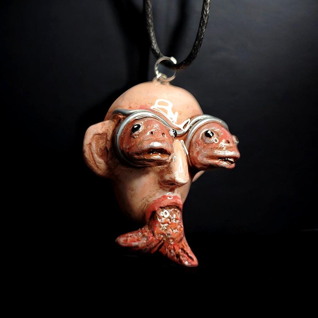 Fish Through Face Necklace ā Handmade Clay & Resin Surreal Statement Jewelry, Sculptural Wearable Art OOAK