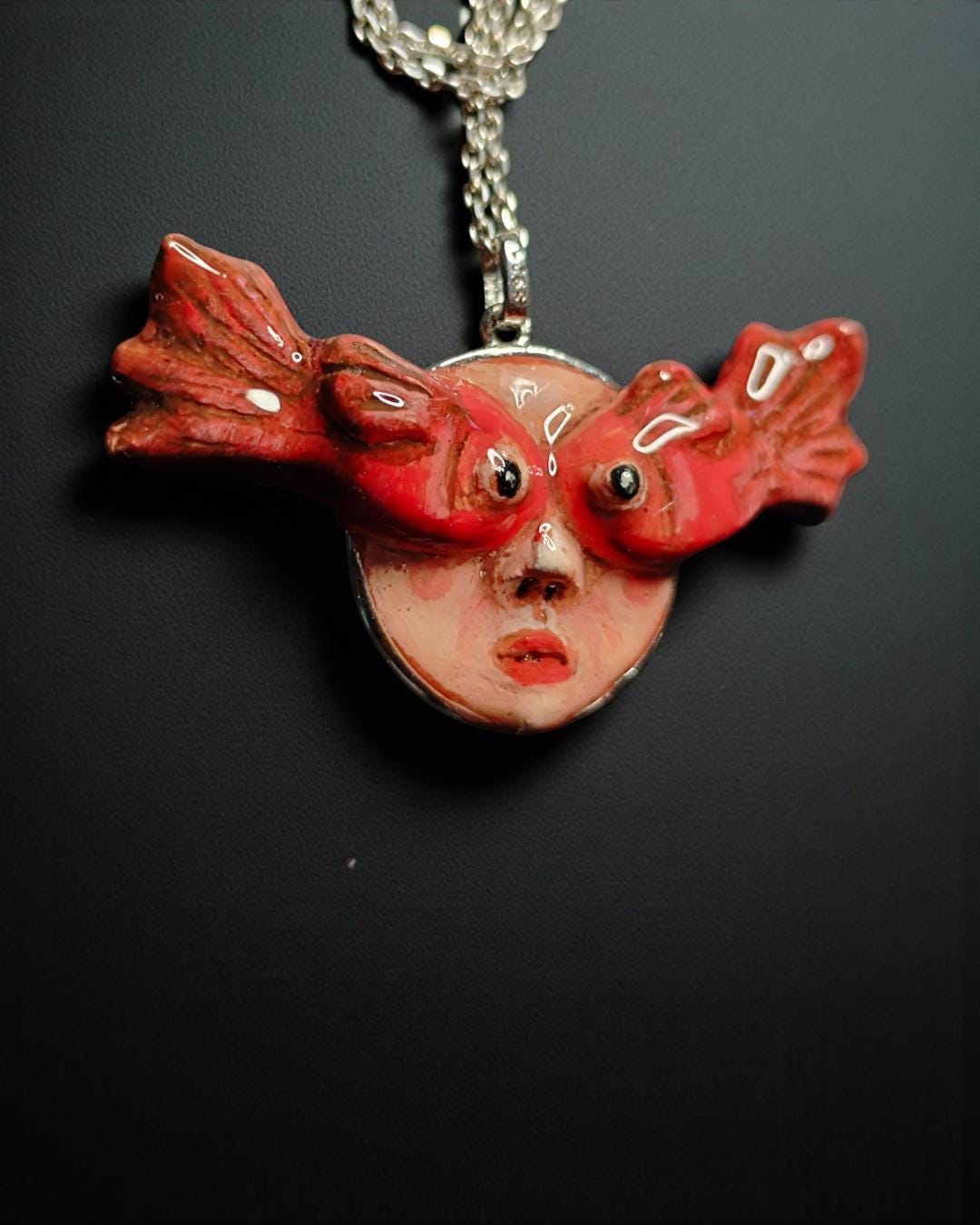 Face with Fish Eye Necklace ā Handmade Clay Surreal Statement Jewelry, Sculptural Wearable Art with Sterling Silver S925 Pendant / Chain