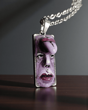 Purple Face with Tongue Out of Forehead Necklace β Handmade Clay & Resin Surreal Statement Jewelry, Sculptural Fantasy Wearable Art with Stainless Steel Chain / Pendant - SAMA