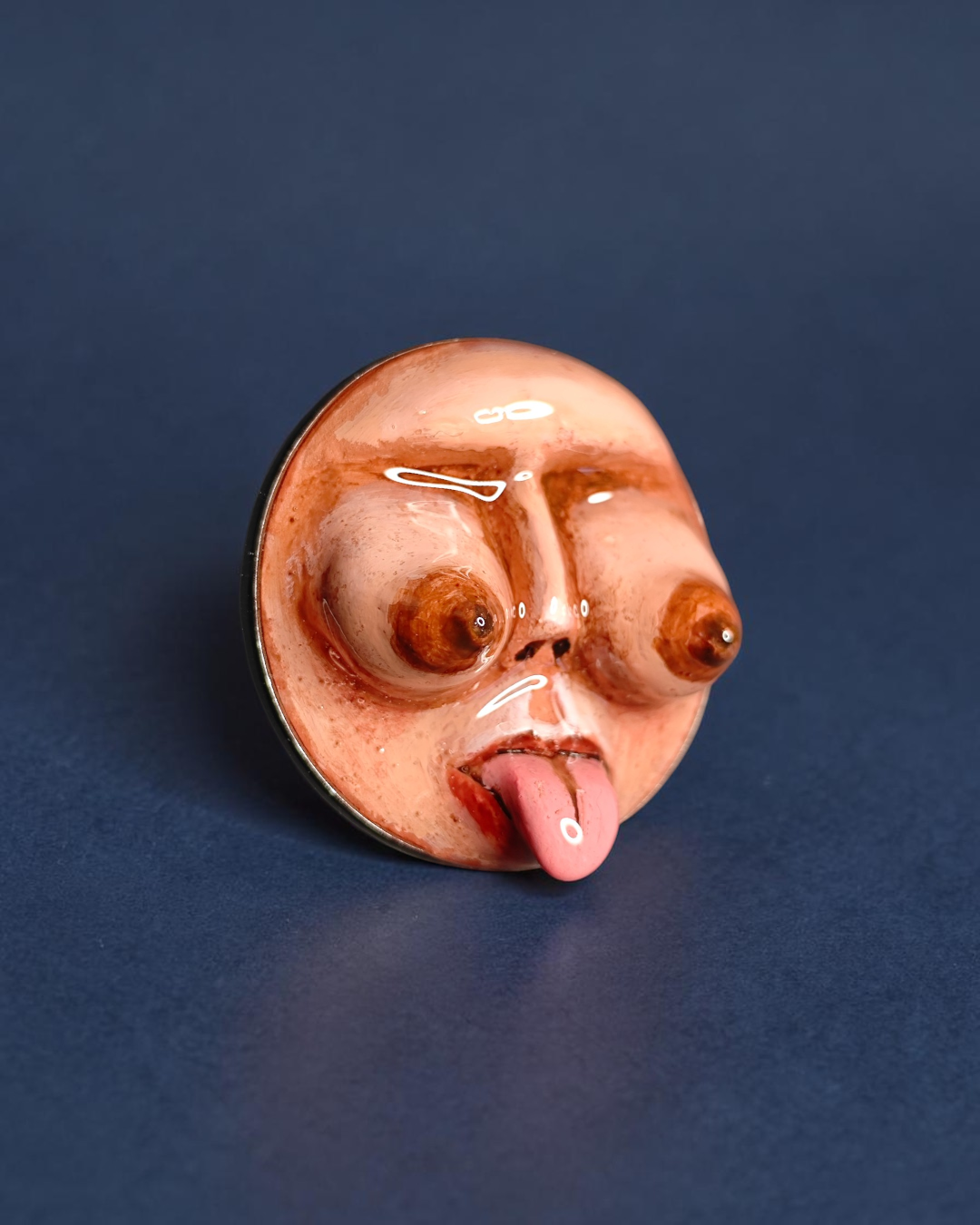 Feminine Body Form with Tongue Out Pin Button – Handmade Clay & Resin Surreal Wearable Art with Stainless Steel Pin Back